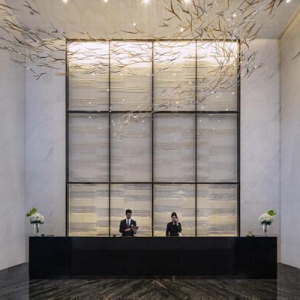 重庆尼依格罗酒店携手雅典表打造奢华云端套房